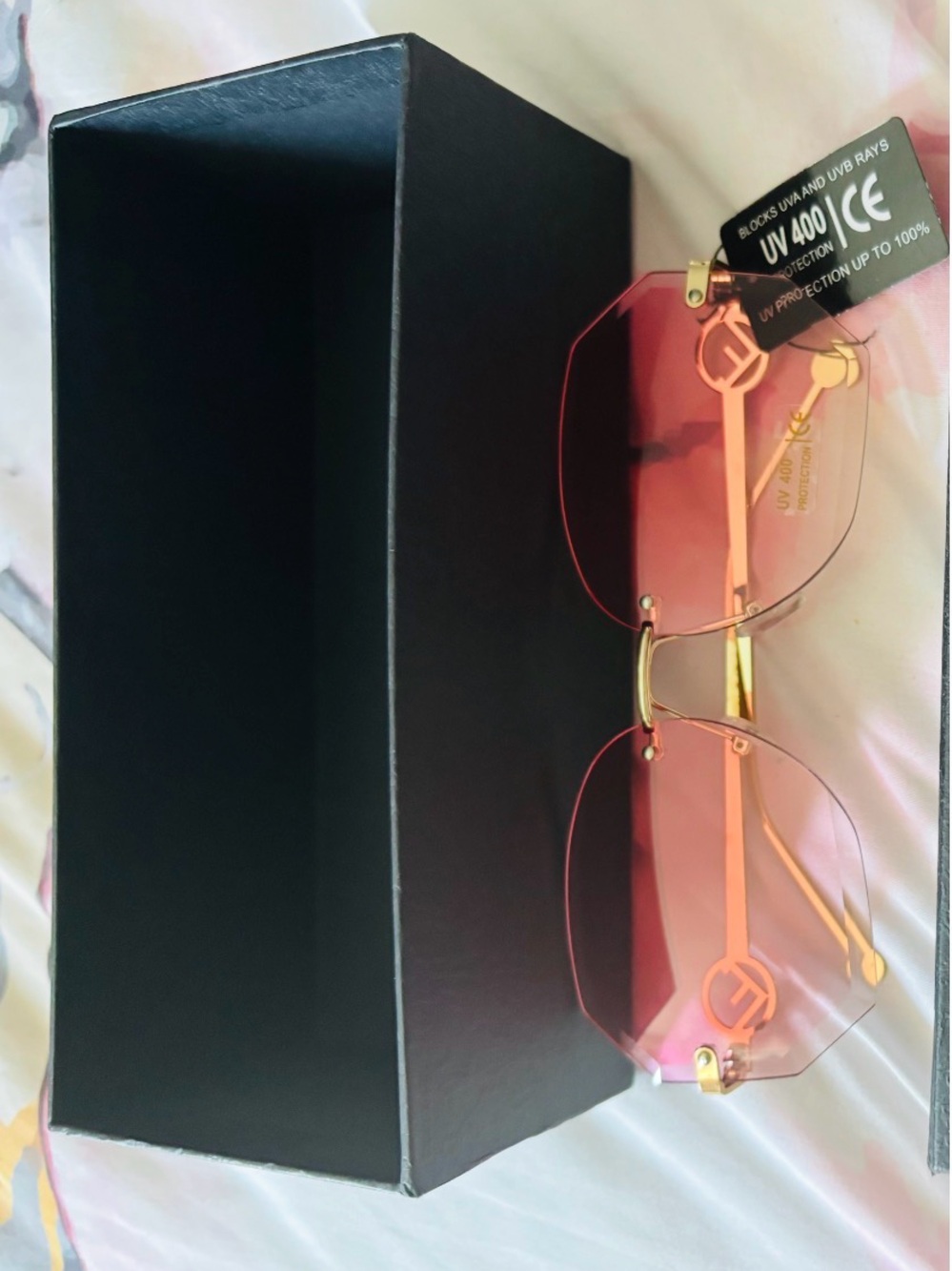 Rimless Pink lens women's Sunglasses with Gold Bridge